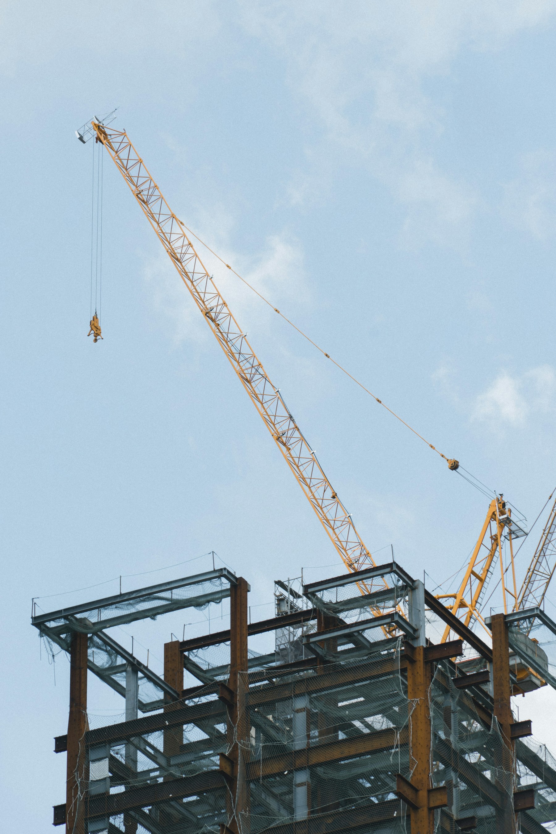 Tower crane above an active construction site