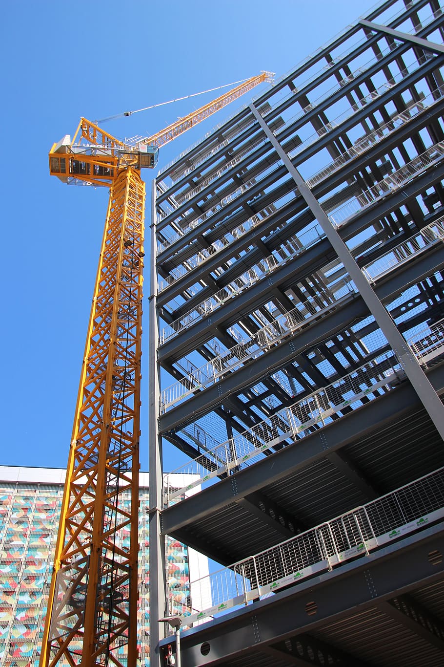 Crane and steel structure at a construction site
